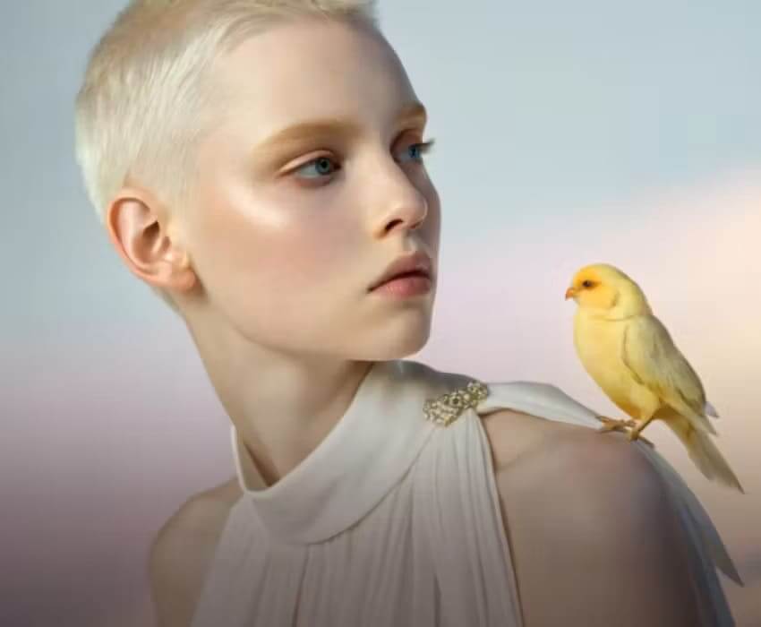 Gemini Omni product video — an e-commerce skincare ad showing a model applying cream with a visible before-and-after skin transformation, generated from a product reference image.